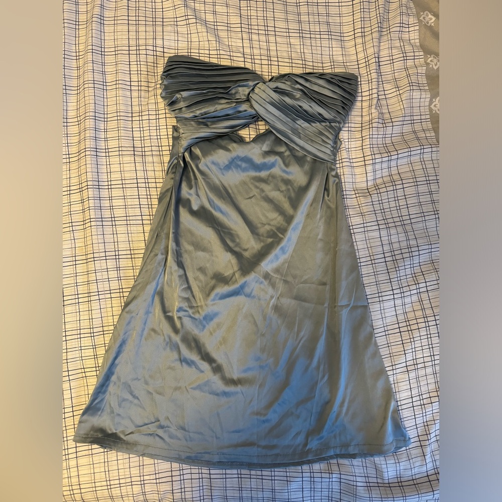 strapless mini dress with open back detail, featuring a blue and silver color